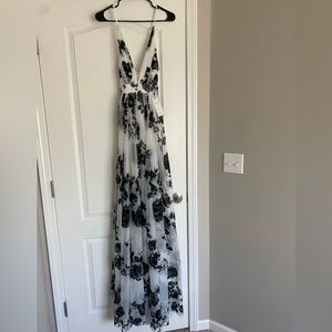 Red Dress Boutique - Black and White Floral Maxi Dress with Slits